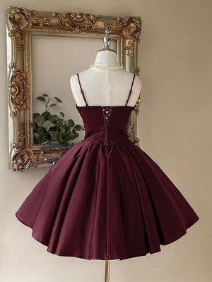 A-line/Princess Spaghetti Straps Bow Short/Mini Satin Homecoming Dresses